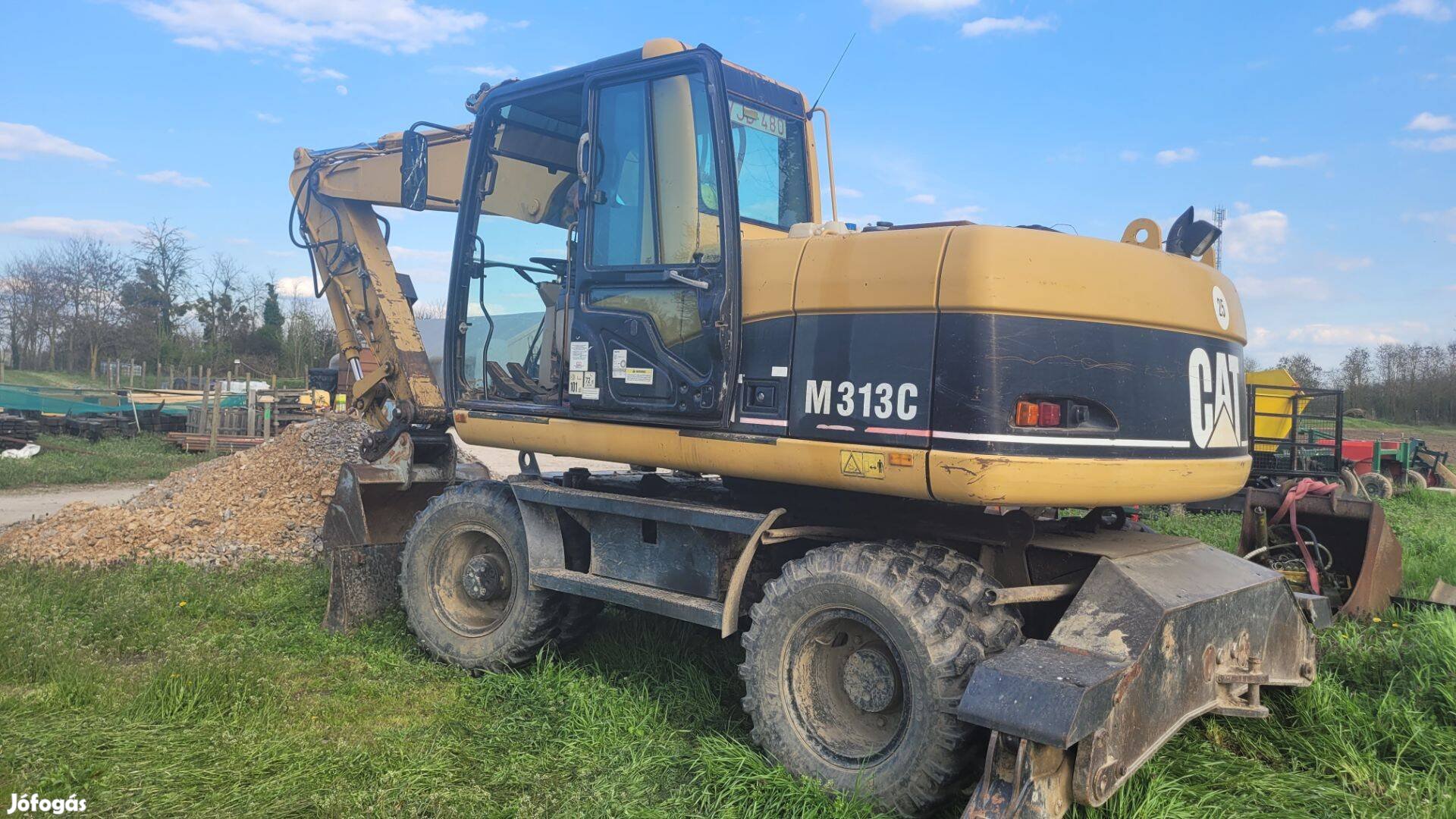 Caterpillar M313C gumikerekes forgókotró eladó