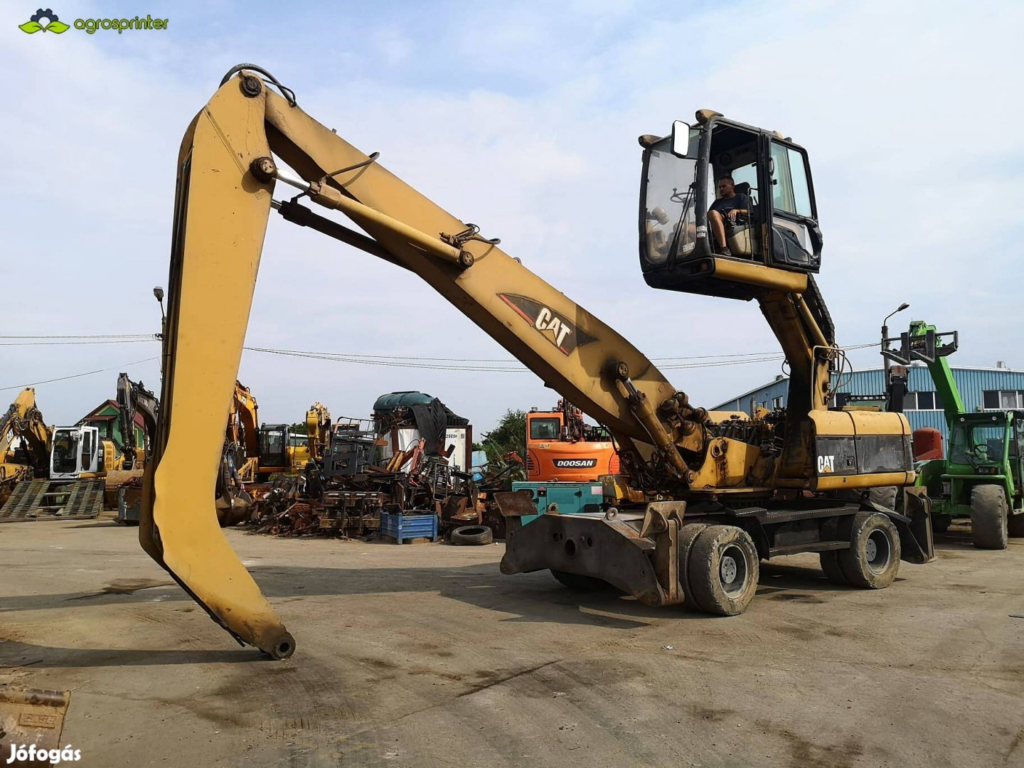 Caterpillar M322C MH emelhető fülkés forgó-rakodó gép