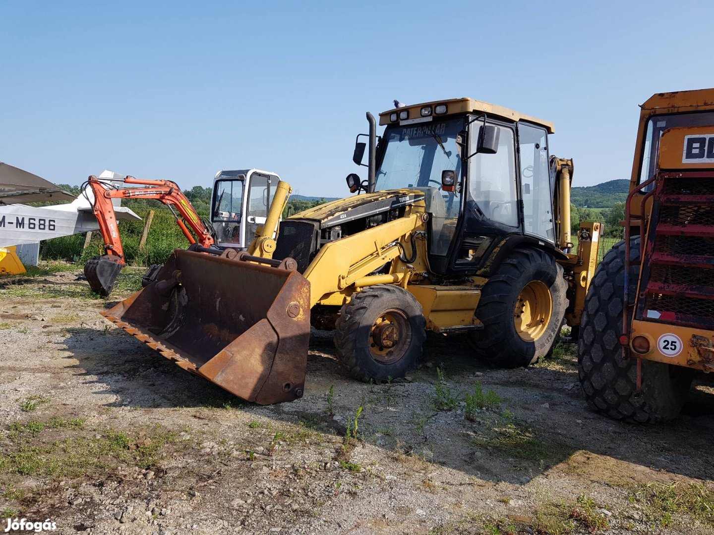 Caterpillar kombigép darabokban