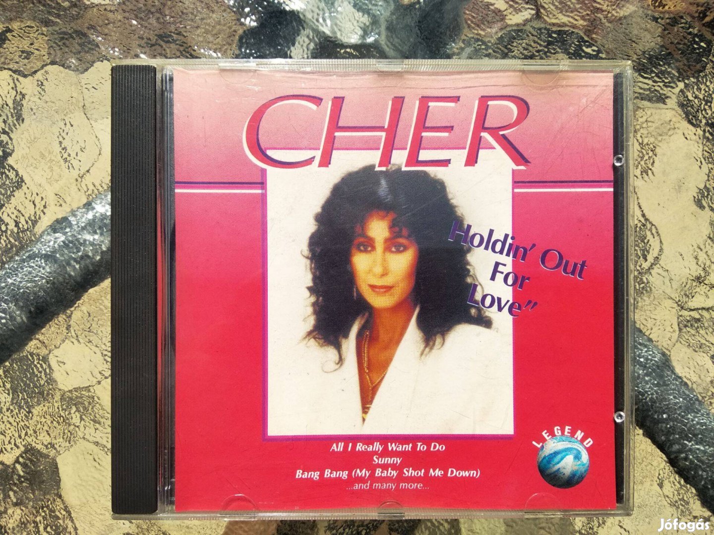 Cher: Holdin' out for love