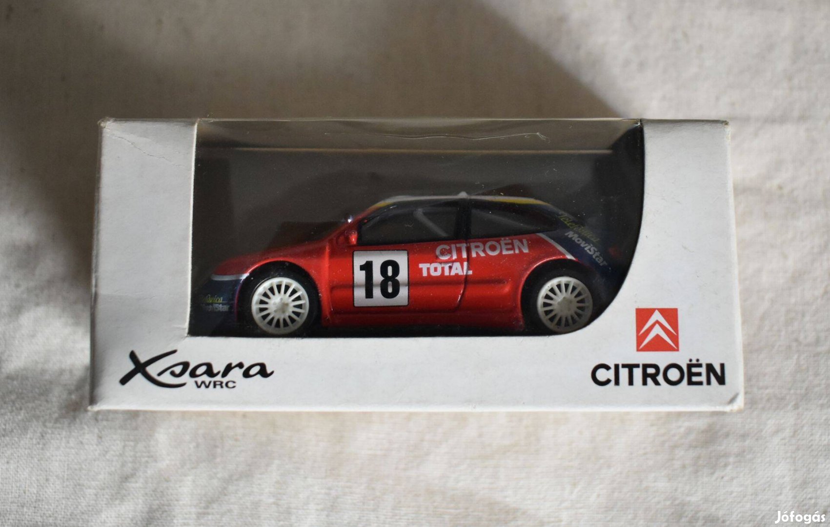 Citroen Xsara WRC 1:64 méretarányos modell dobozában