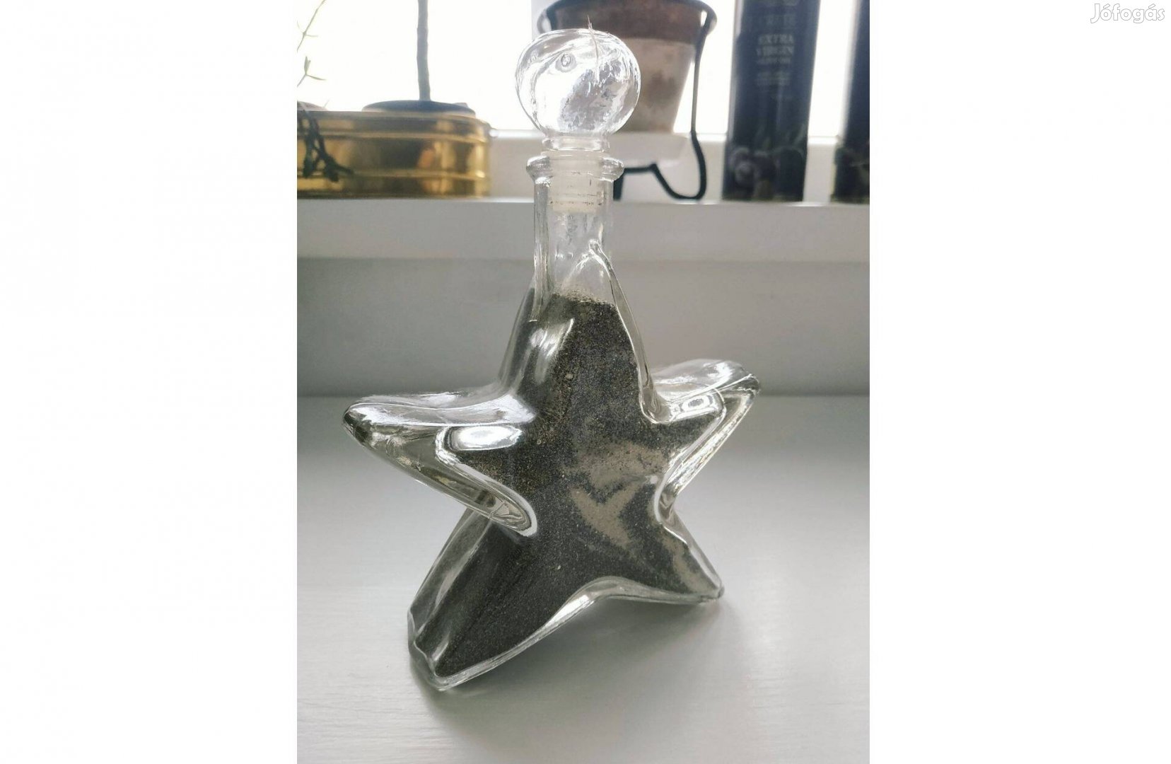 Csillag alakú üveg, dekoratív homokkal töltve
