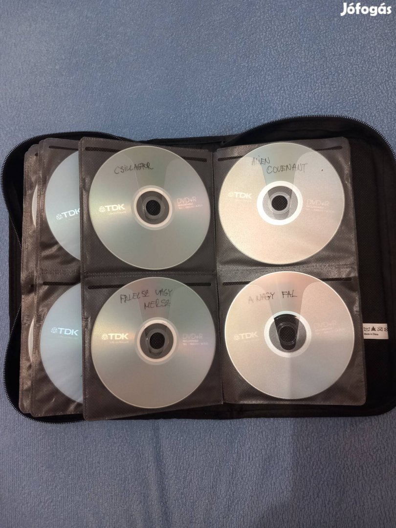 DVD filmek - mappában - 96 db.