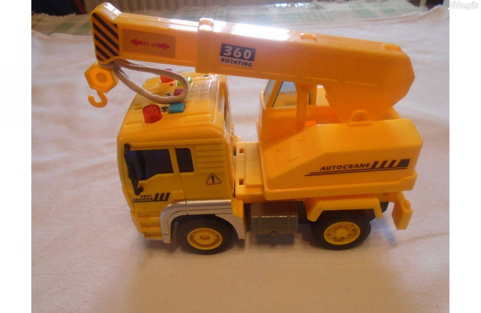 Darus elemes teherautó - hosszan kihúzható, sárga színű - műanyag