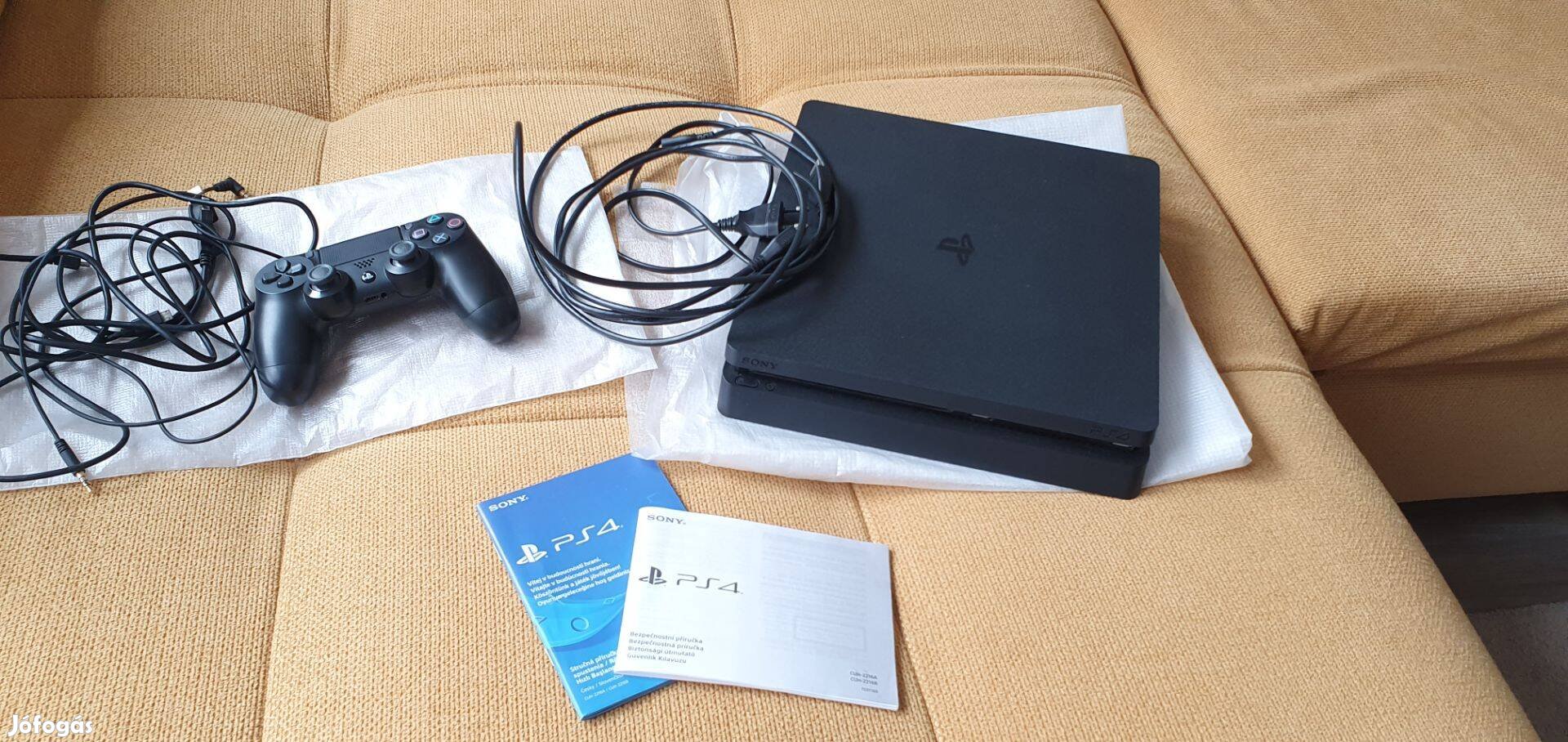 Eladó Sony PS4 slim gép 1 db controllerrel és 7 db játékkal