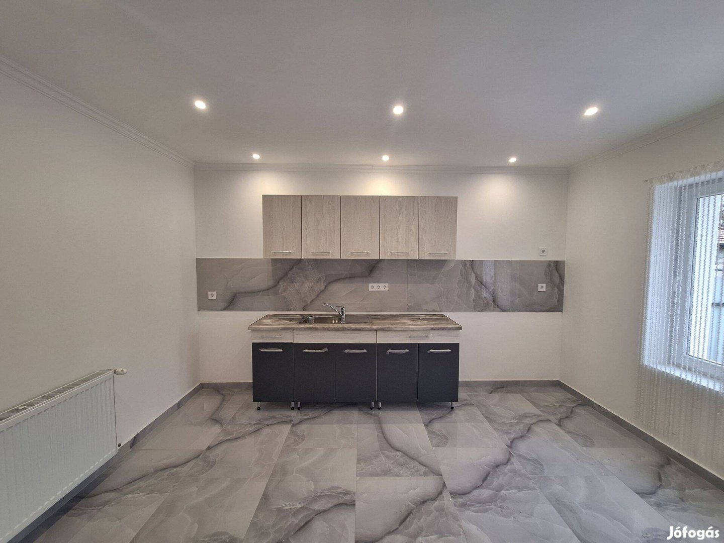 Eladó Teljeskörűen felújított kertvárosi otthon 62 m lakás