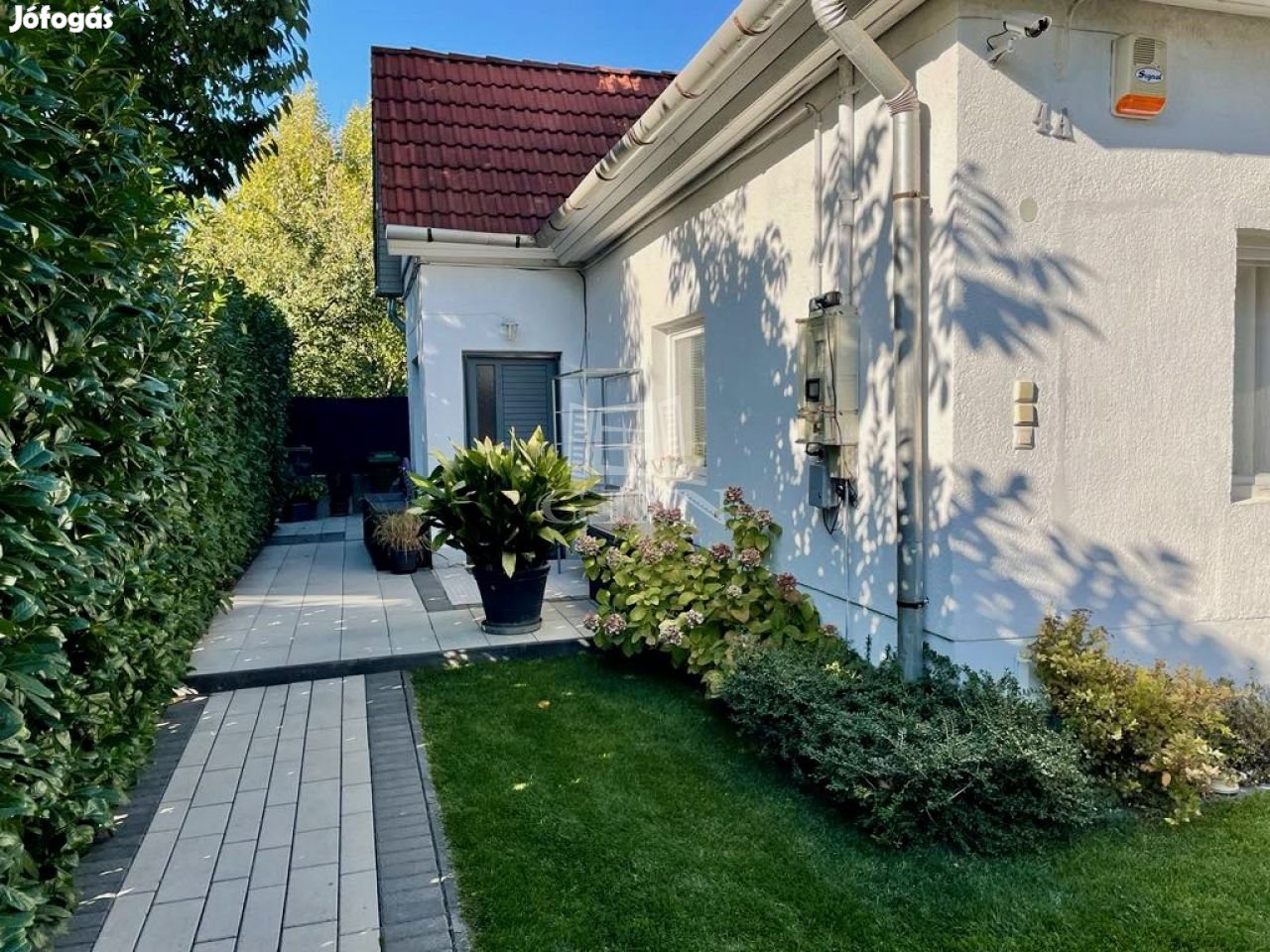 Eladó családi ház Budapest XXII. kerület, Felújított, kertkapcsolatos