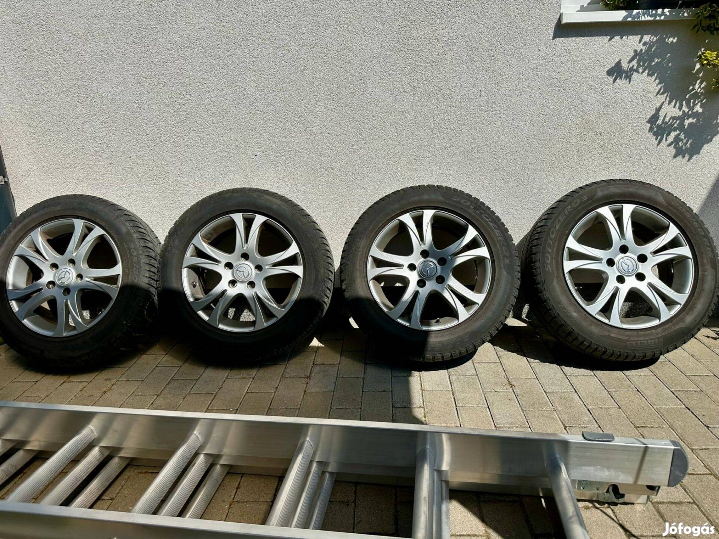 Eladó gyári Mazda alufelni szett Pirelli téli gumikkal 205/60 R16