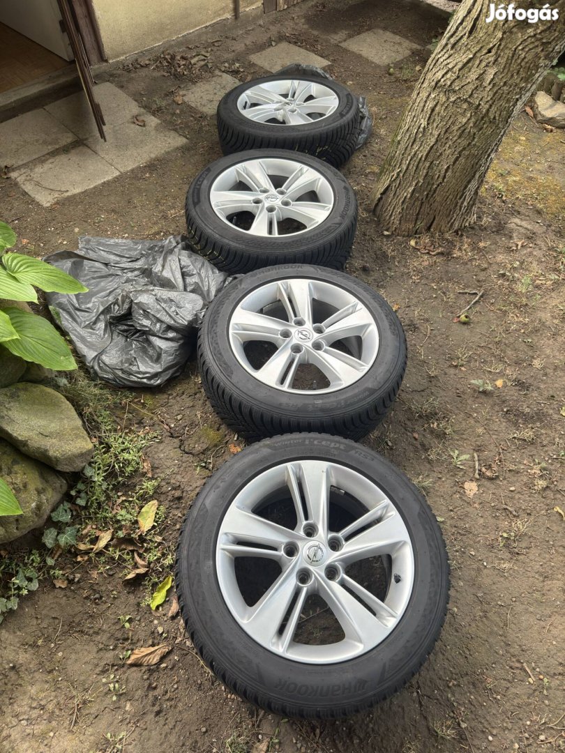 Eladó gyári Opel alufelni Hankook téli gumival 