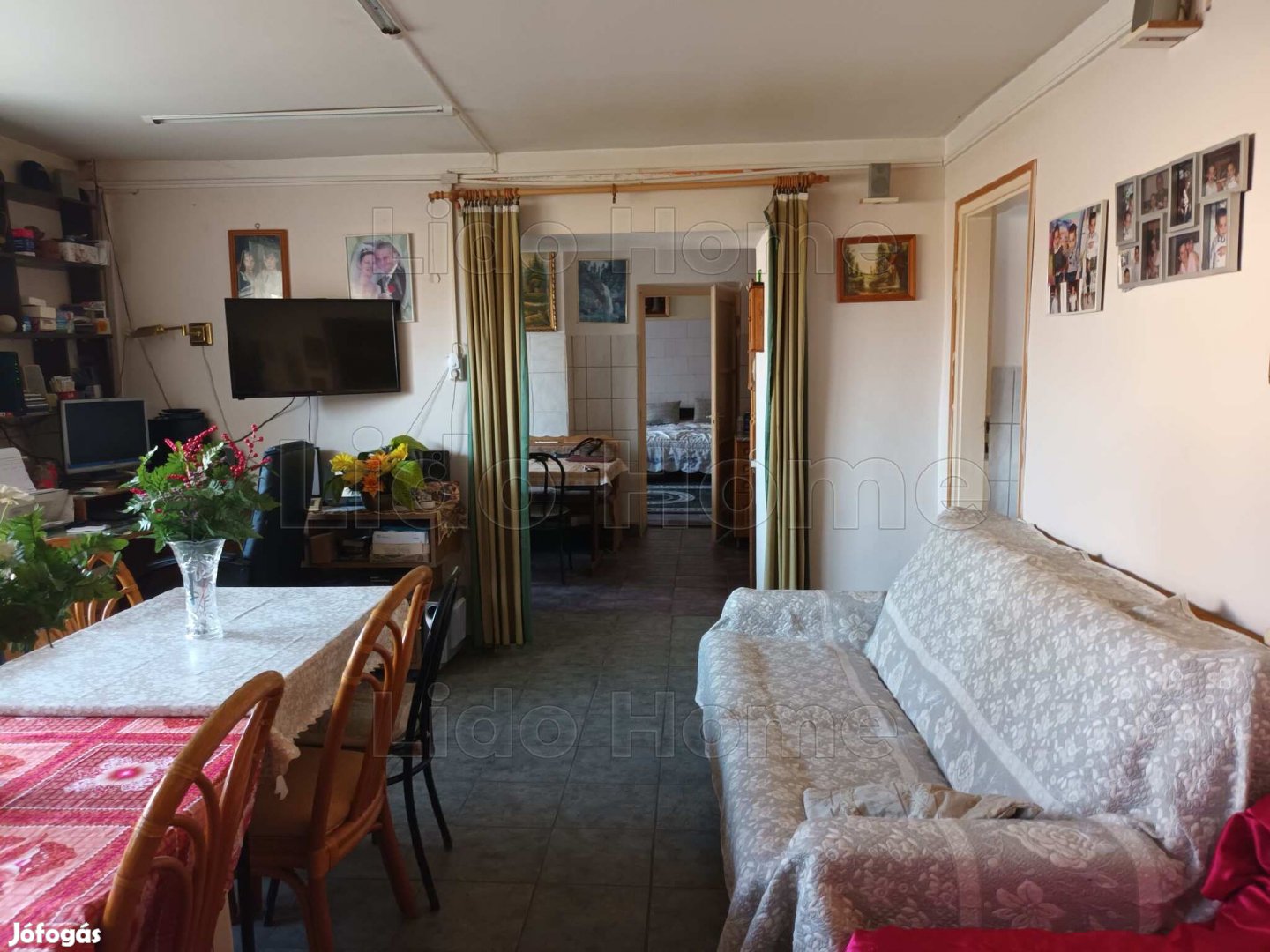 Eladó kislángi családi ház üzlethelyiséggel