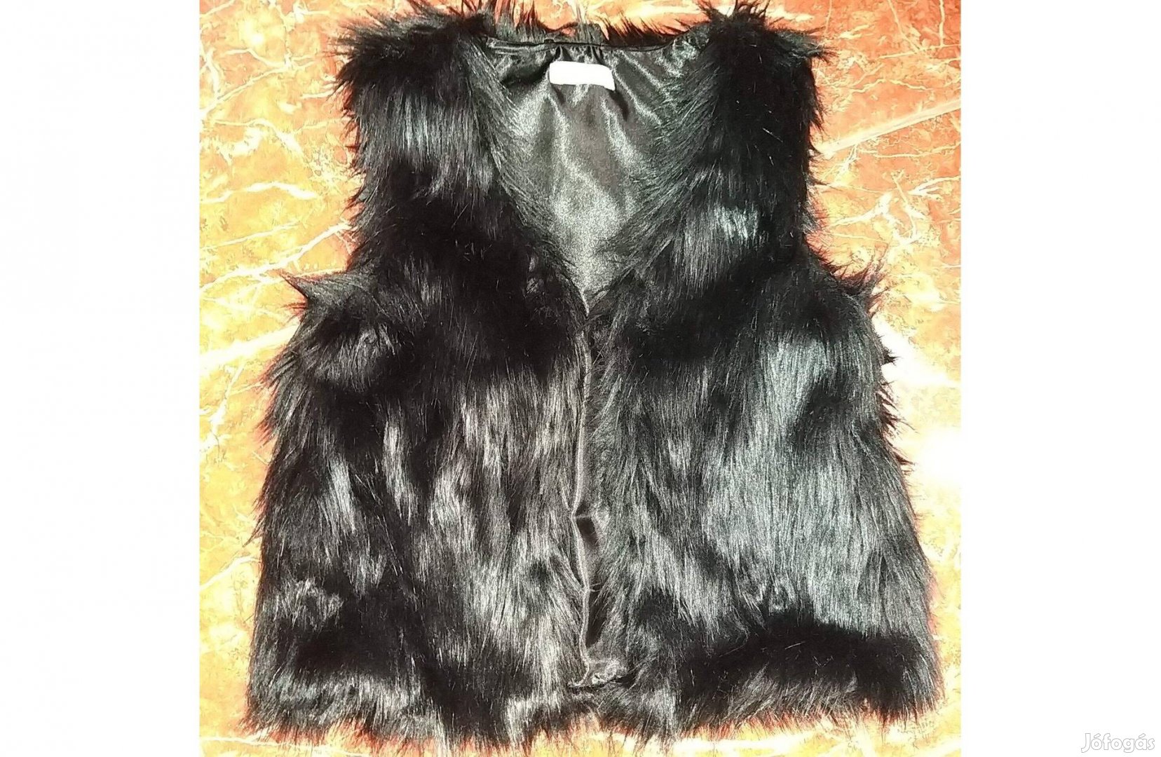 Eladó mellény, 146152-es méretben