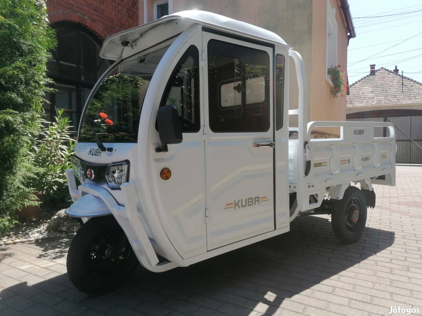 Elektromos teherhordó tricikli. 