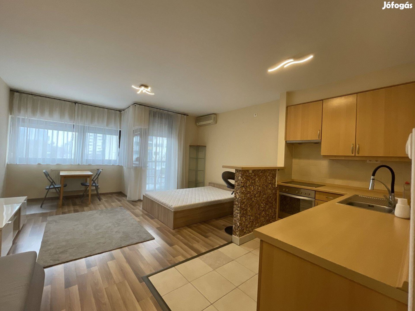 Exkluzív garzonlakás a Riverside Apartmanházban