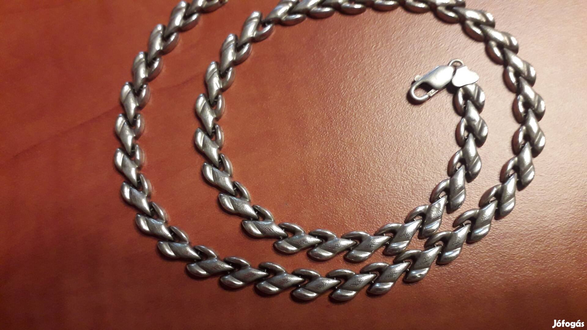 Ezüst karkatő gyűrű nyakék elado