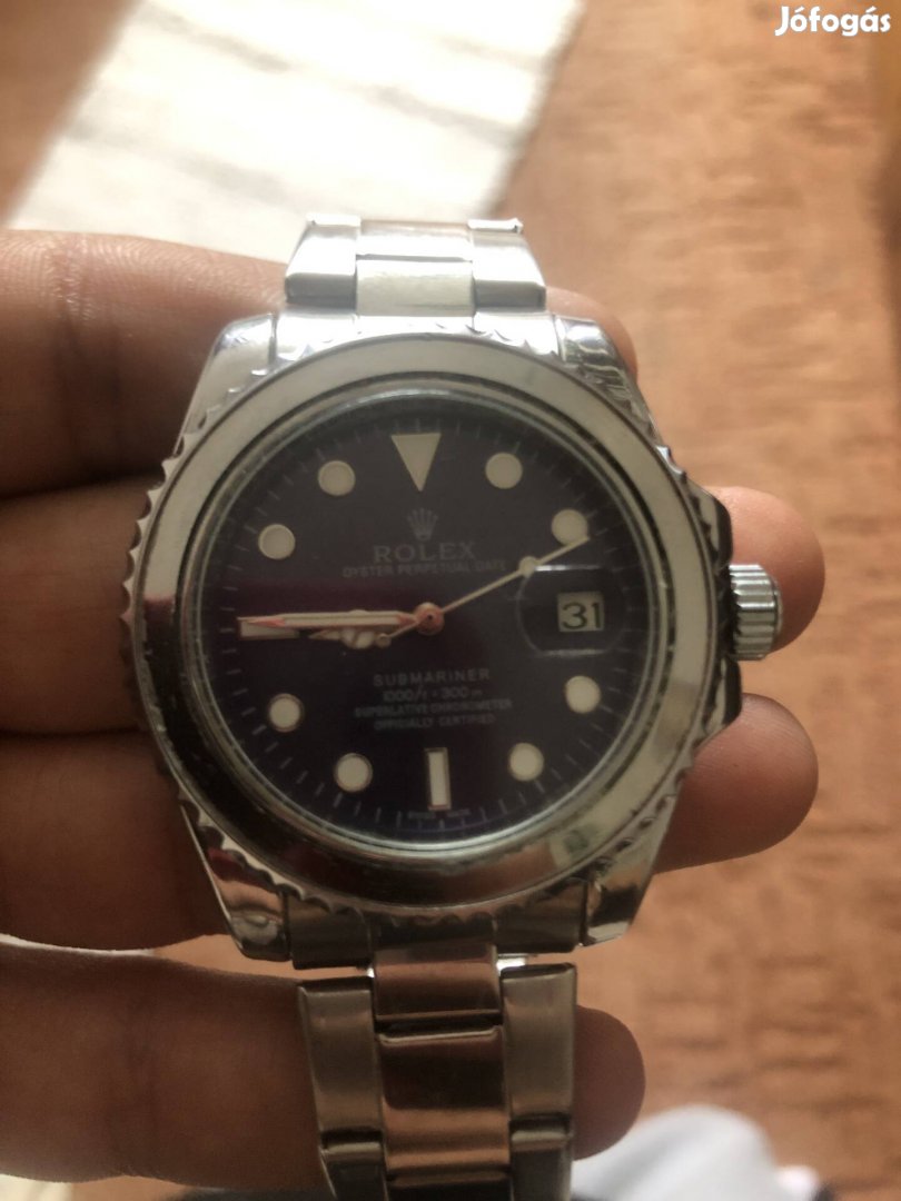 Ezüst színű Rolex óra 