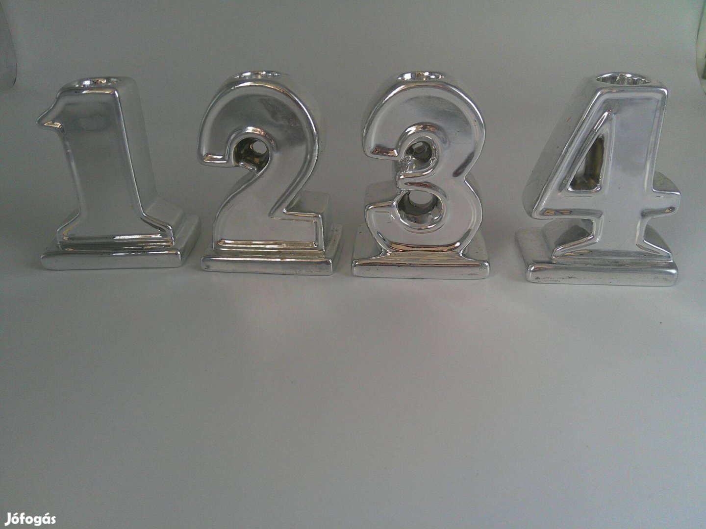 Ezüst színű porcelán Karácsonyi gyertyatartó 4 db.