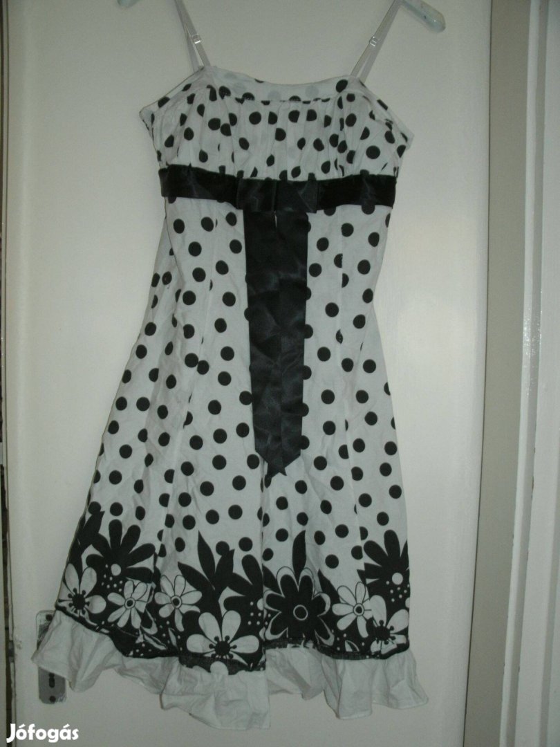 Fehér alapon fekete pöttyös ruha, hátán gumis, pántja