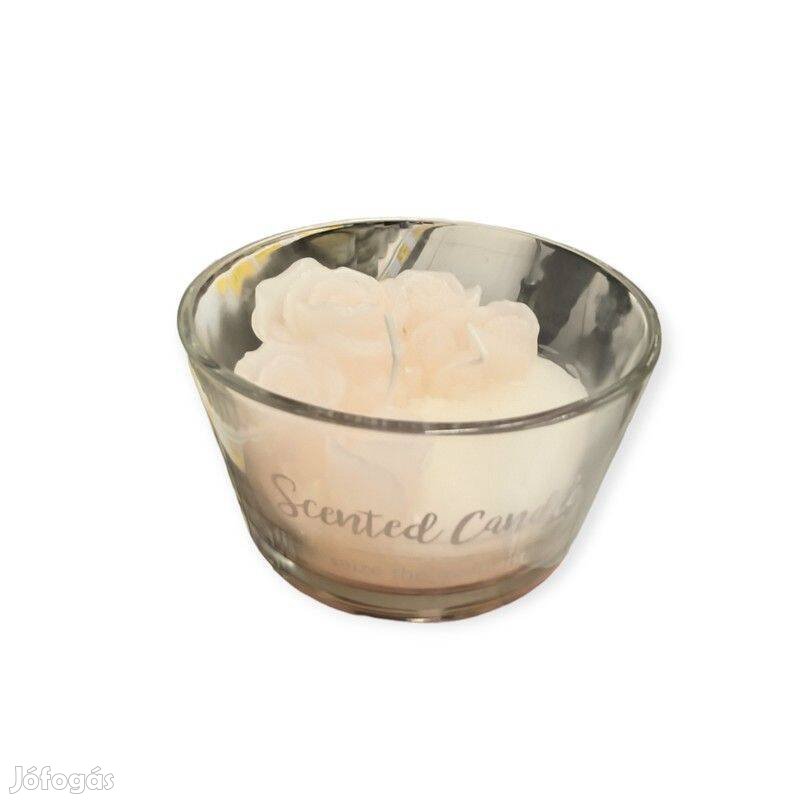 Fehér illatgyertya rózsával üvegedényben