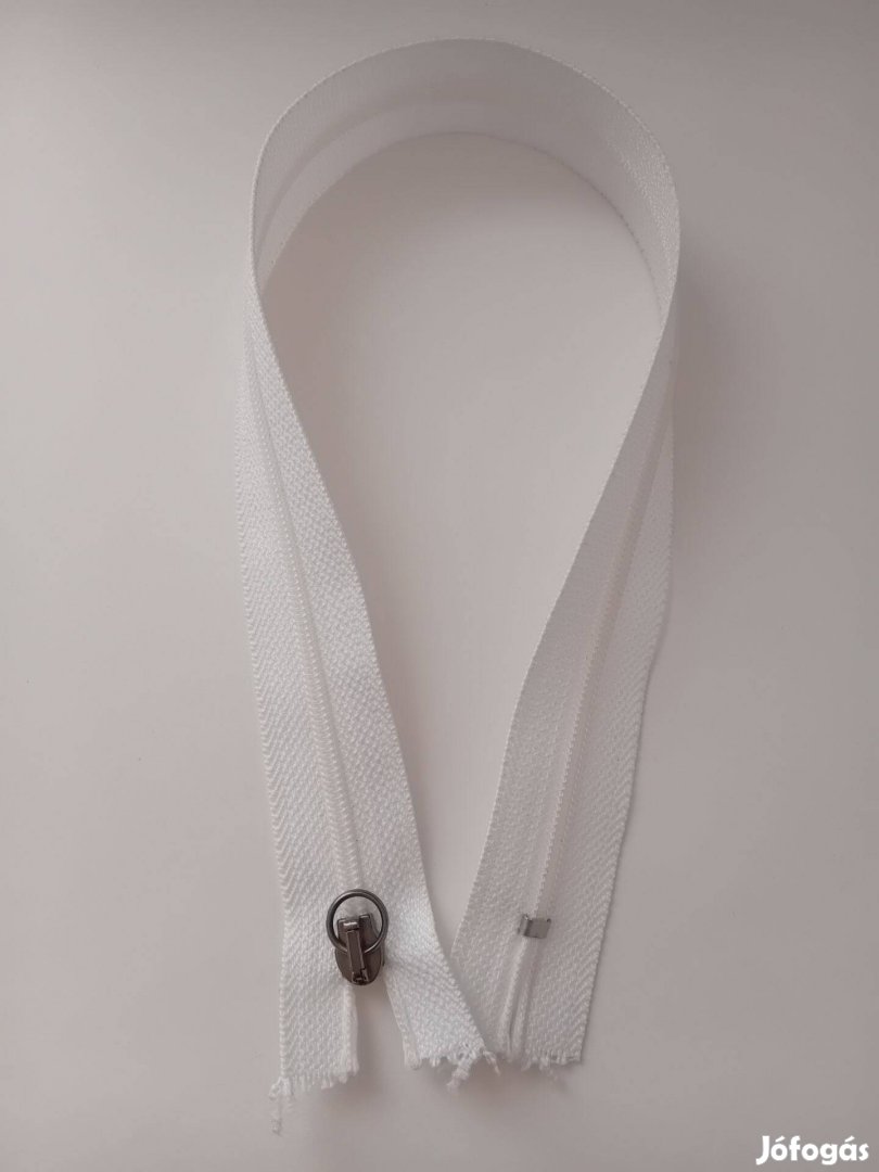 Fehér zárt cipzárak, műanyag, új