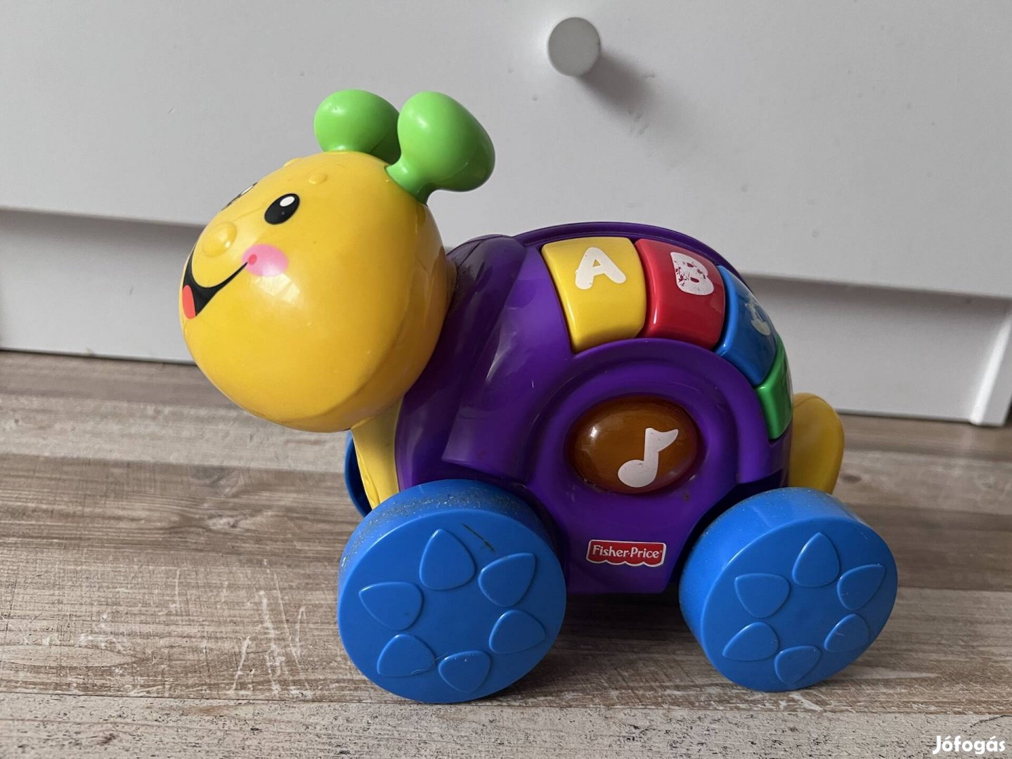 Fisher Price zenélő csiga