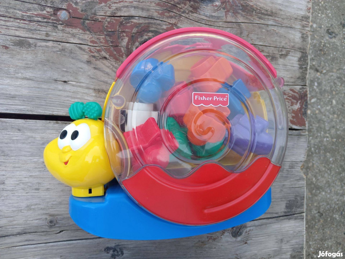 Fisher price formaválogató, építő, zenélő csiga