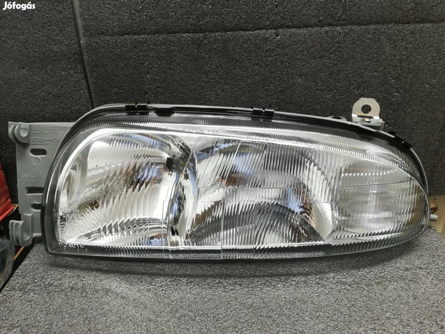 Ford Fiesta fényszóró bal 1996 -> 1999 (H7,H1)