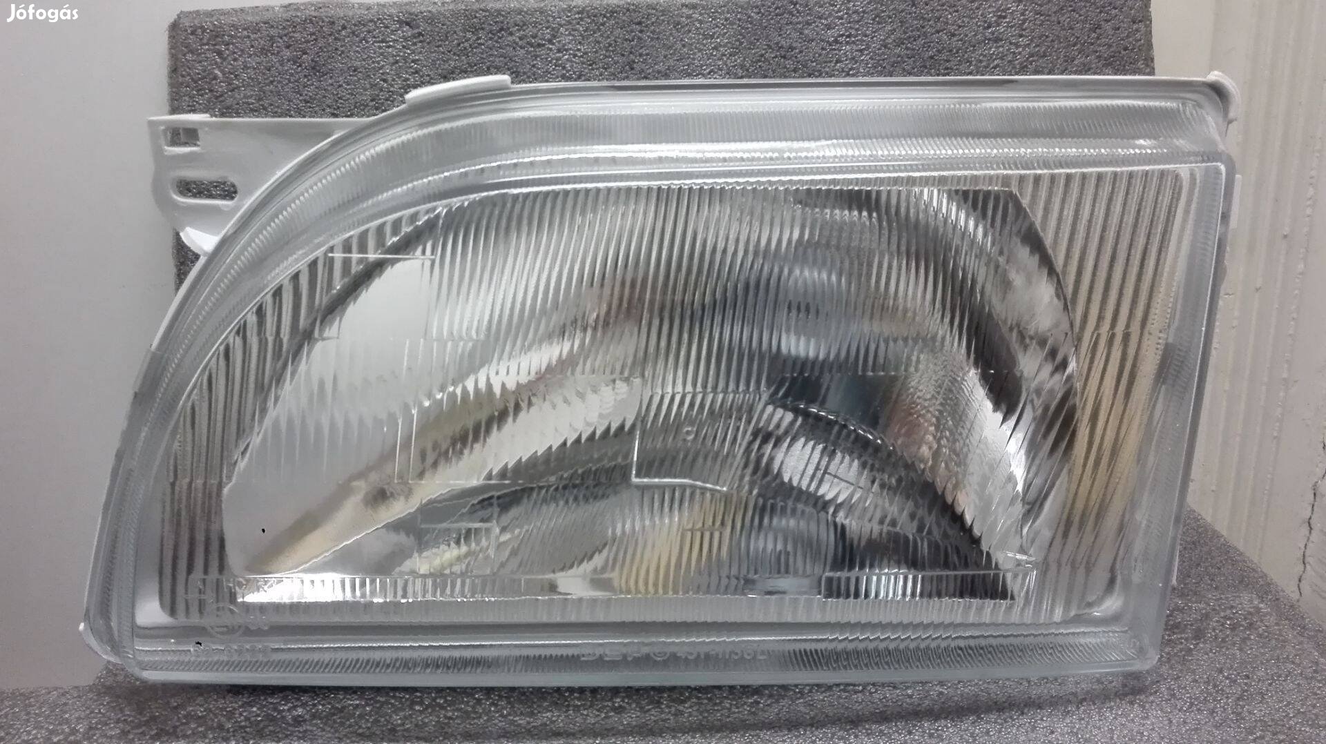 Ford Transit fényszóró bal 1991 -> 1994 (H4) üvegbúrával