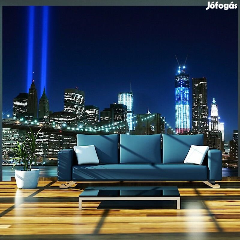 Fotótapéta - Fényszórók a város felett