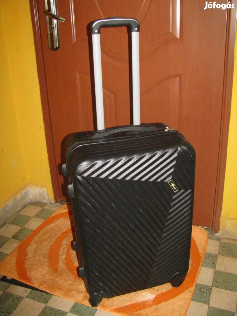 Guruló bőrönd 63x40x27, 4 gör, Rinobag, számzár, dupla ,kiváló