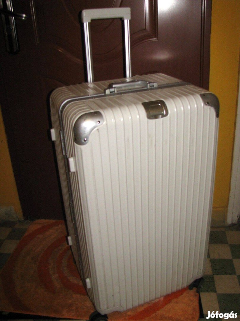 Guruló bőrönd 80x47x38, 4 gör, 3zár dupla , fehér, Óriás, ár alatt
