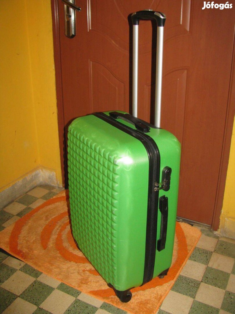 Guruló bőrönd, 63x40x24, 4gö.számzár gyönyörű, keményfalú