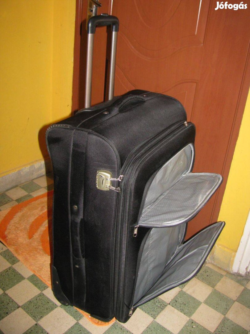 Guruló bőrönd, 75x46x34-38, 4gö,számzár, fémpánt Ormi fekete