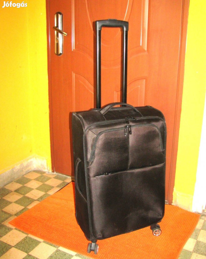 Gurulós bőrönd 4 görgő fényes 65x40x25 vízálló újszerű Travel fekete