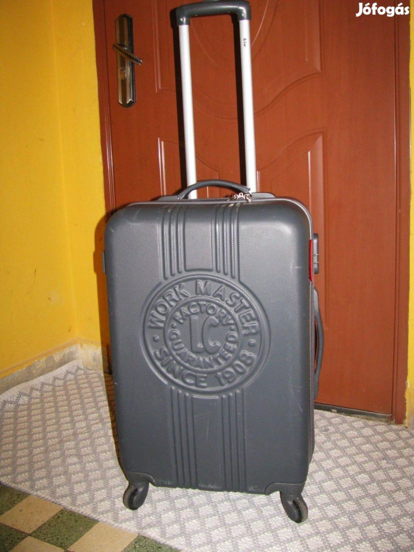 Gurulós bőrönd 63x38x25 számzár hibátlan 4 gö elegáns Lee