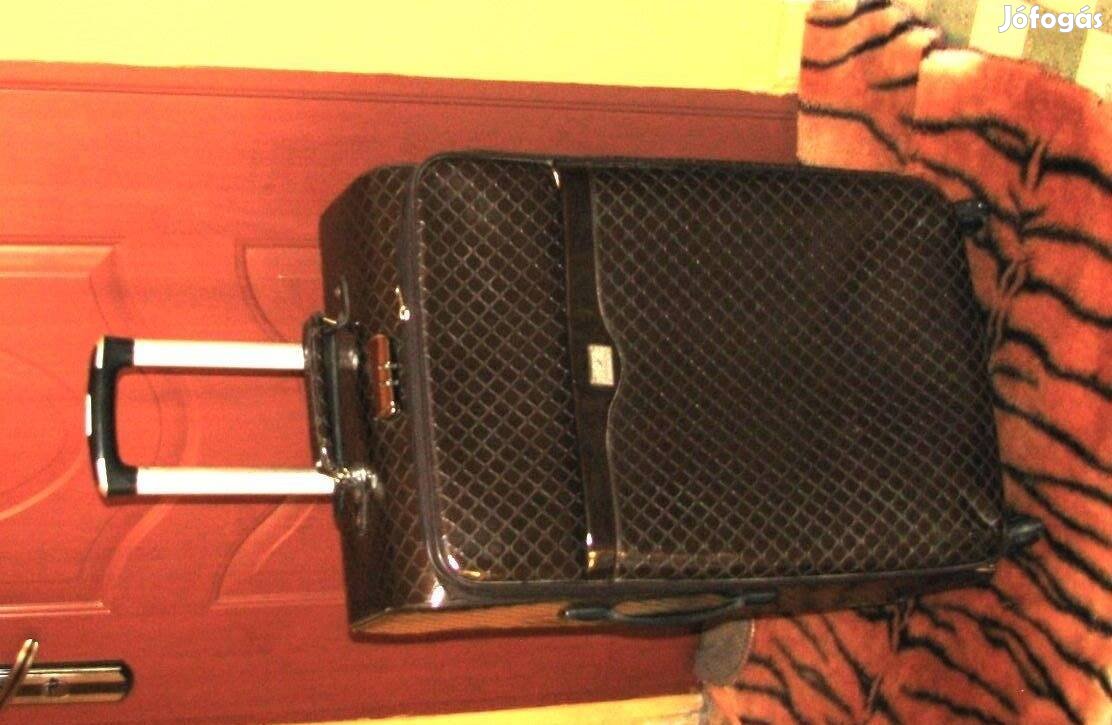 Gurulós bőrönd 73x44x23-33, 4 gö. számzár csodaszép, hibátlan