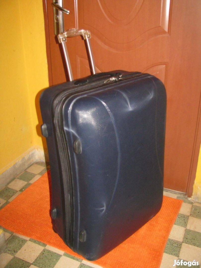 Gurulós bőrönd 74x50x30-35 dizájnos íves hátú Abs keményfalú