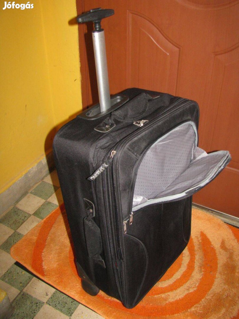 Gurulós bőrönd Travelburg, 60x37x20-24, vászon 2 görgő erős kar