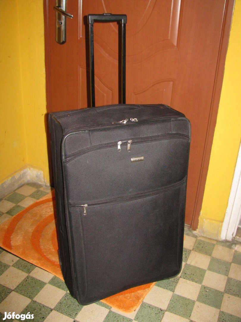 Gurulós bőrönd, 74x46x30, Travelite, kemény vászon, kitűnő