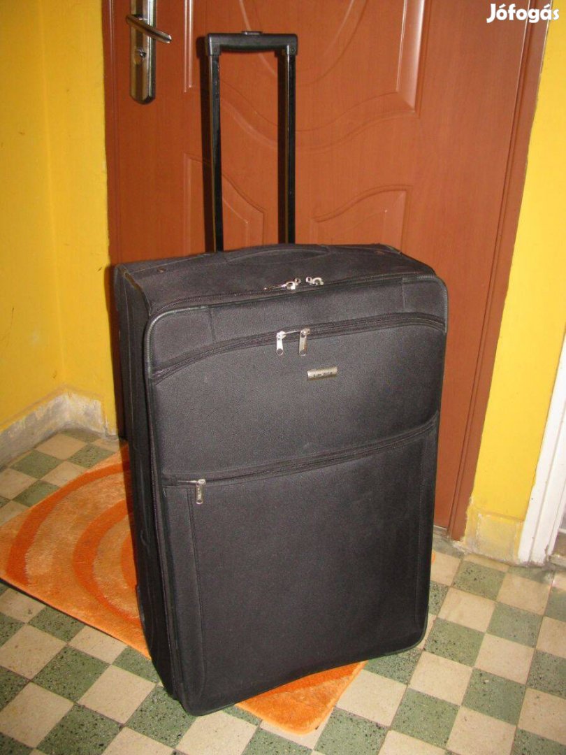 Gurulós bőrönd, 74x46x30, kemény vászon Travelburg, masszív Szép