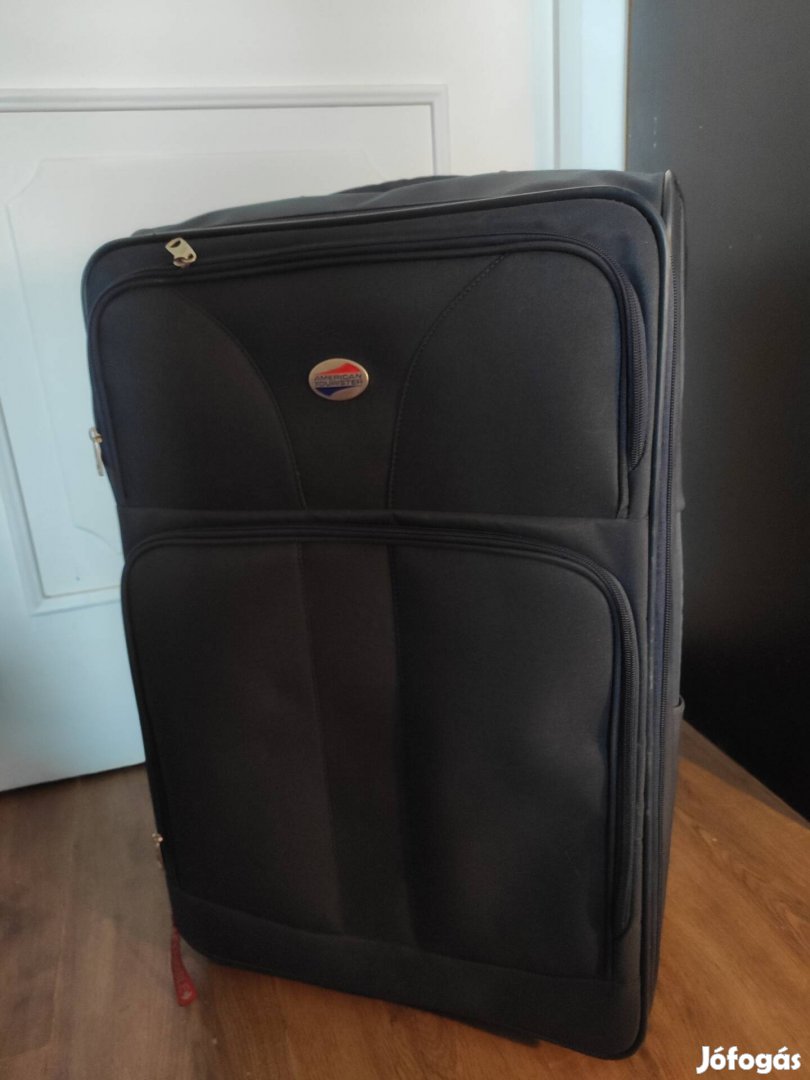 Gurulós bőrönd - American Tourister kö