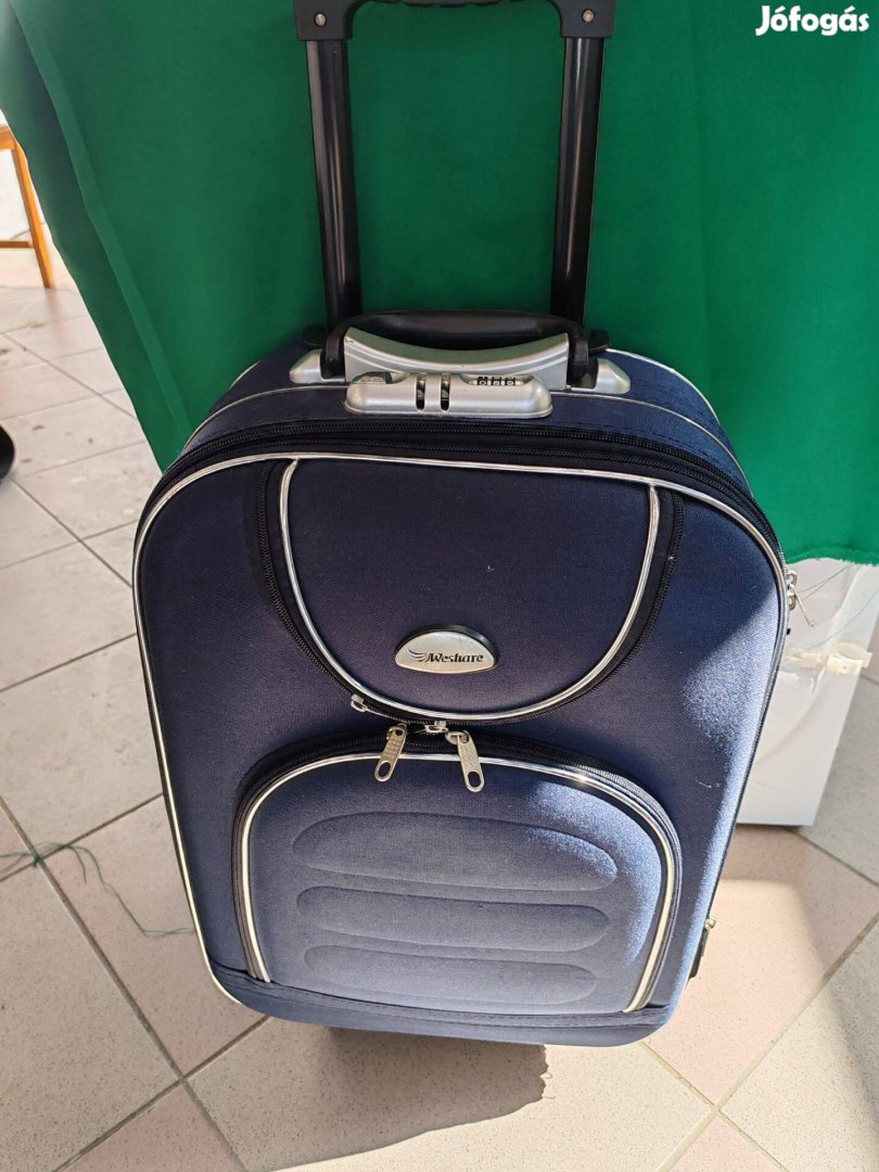 Gurulós utazótáska bőrönd koffer