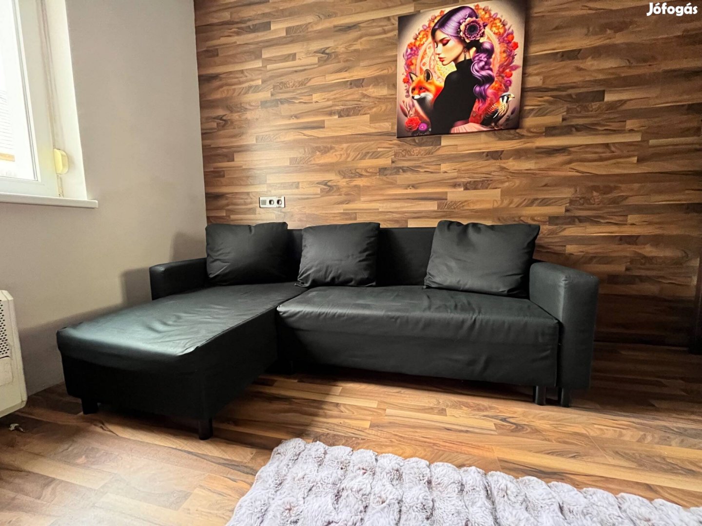 Használt jó állapotú fekete sarokkanapé
