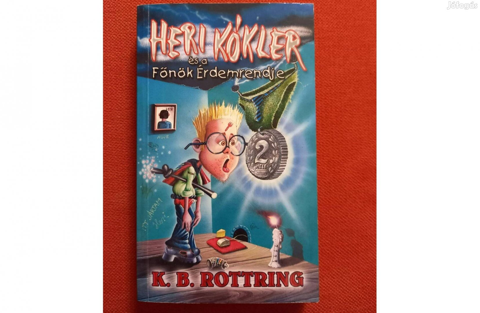 Heri Kókler és a Főnök érdemrendje könyv