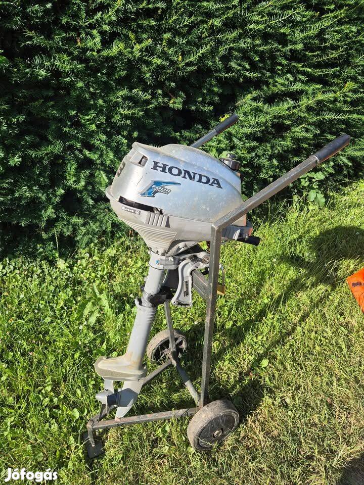 Honda 2,3 csónakmotor kerekes szállítóval, tankkal