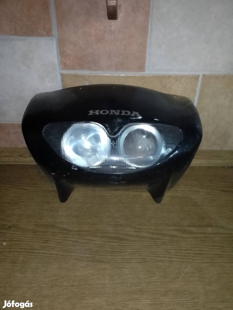 Honda robogó motor fényszóró panel 