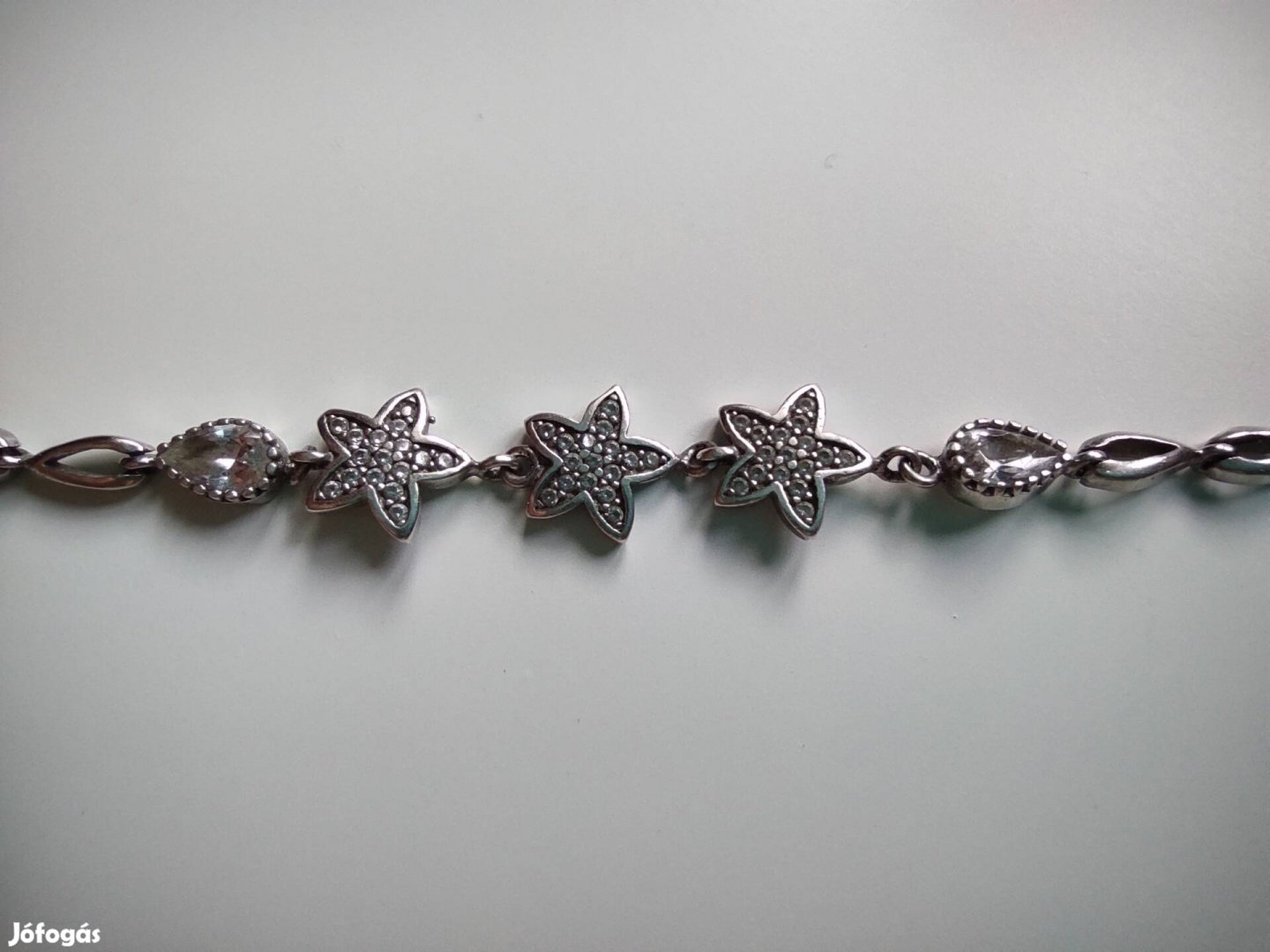 Jelzett ezüst csillagos karkötő
