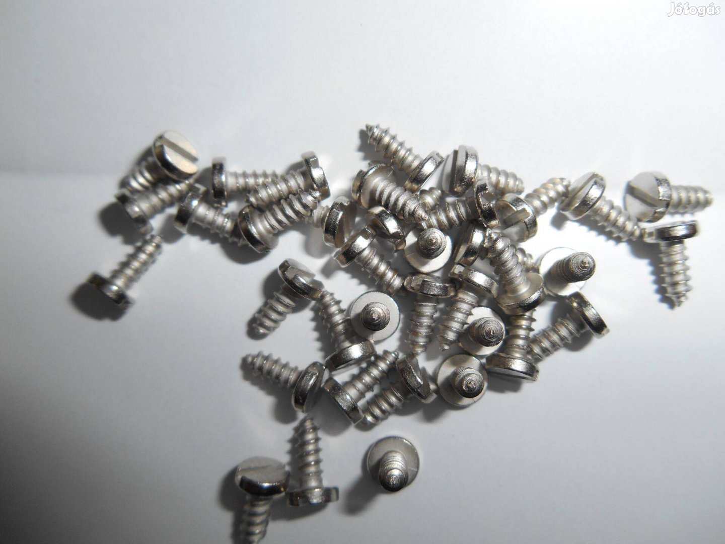 Kazetta alkatrész Kazettatok rögzítőcsavar