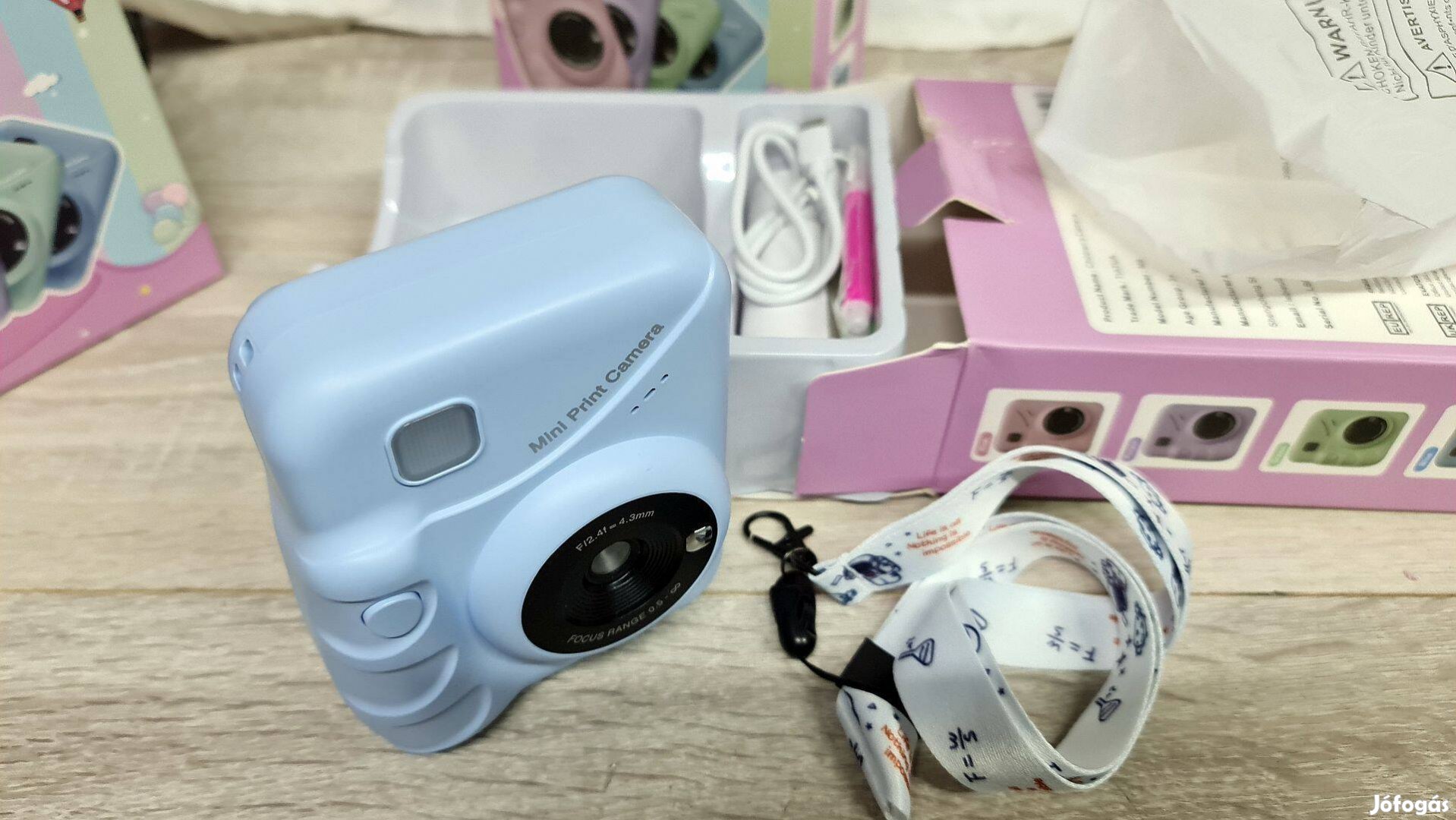 Kékszínű nyomtatós fényképező és kamera