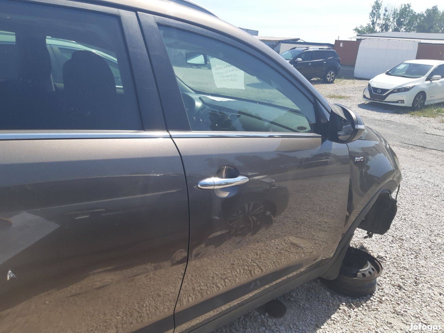 Kia Sportage SL 2.0 CRDi 4WD jobb első ajtó komplett, sérült,javítható