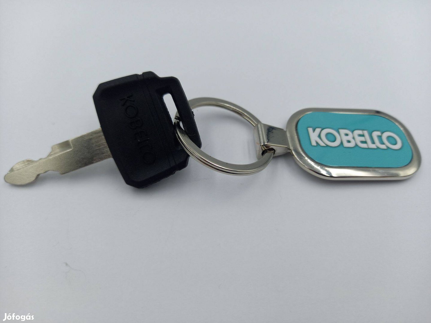 Kobelco munkagép kulcs (műanyag Kobelco felirattal fej rész illetve fu
